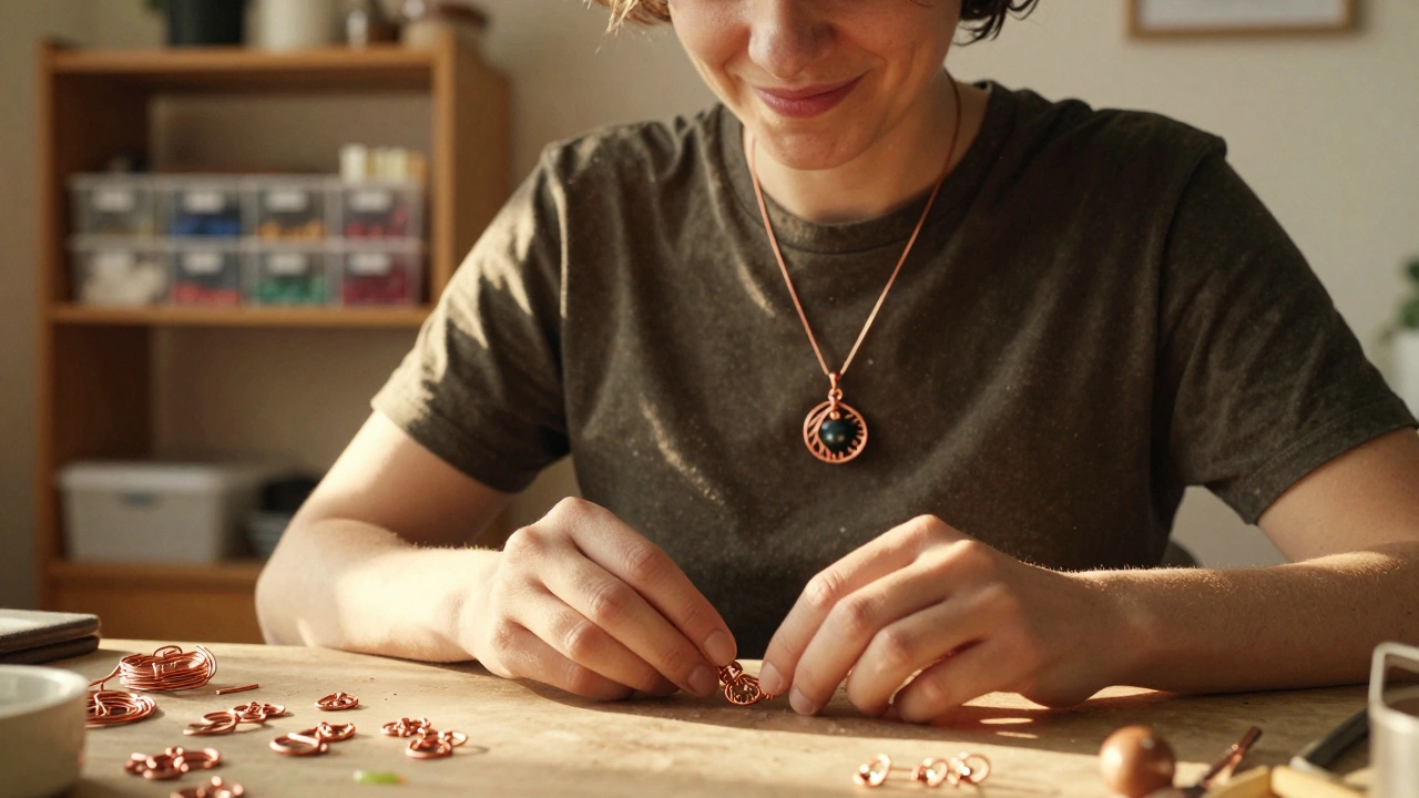 Person wearing a handmade copper wire-wrapped pendant necklace